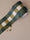 Zoom sur la frise Cadence Vert en rouleau, damier vert sapin, vert olive et blanc — Bilboquet Déco