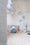 Papier peint panoramique Carpe Diem en tête de lit — détail palmiers et hamac, ambiance balnéaire